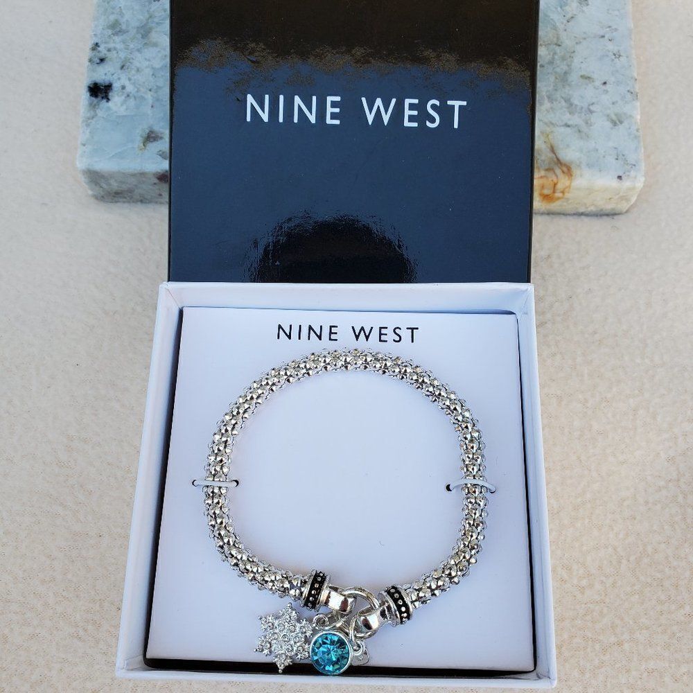Nine West Bracelet with Snowflake and Blue Gem Charms
